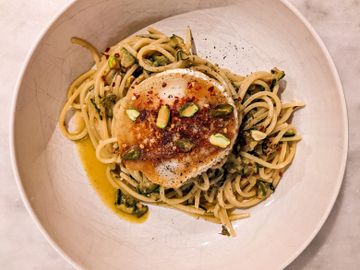 Confit zucchini & basil linguine with goat cheese, pistachios and chili honey